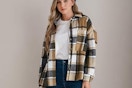 a woman wearing a plaid button down