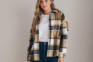 a woman wearing a plaid button down