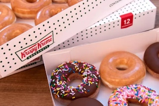 An open box of Krispy Kreme donuts