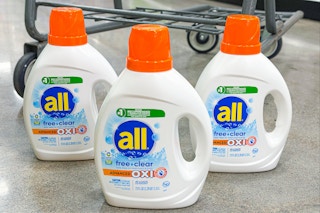 all detergent in floor in front of shopping cart