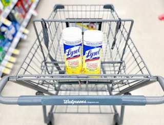 shopping cart with two containers of Lysol disinfecting wipes inside