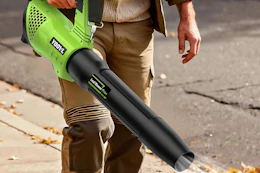 a man using a leaf blower
