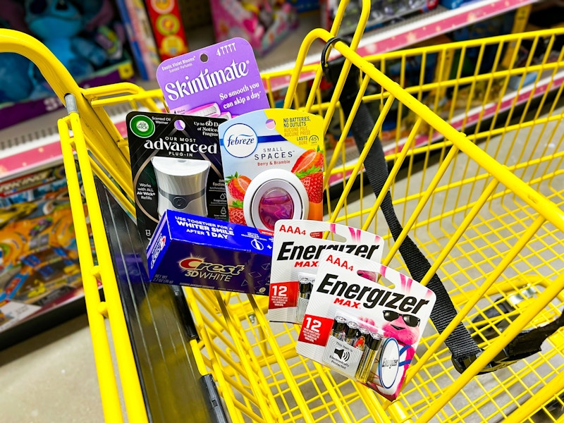 skintimate razors, energizer batteries, air wick warmer, crest toothpaste, and febreze small spaces in a cart