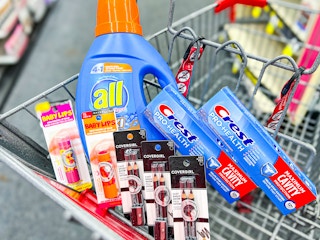 shopping cart with all detergent, crest toothpaste, maybelline baby lips and covergirl eye pencils