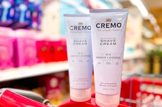hand holding a tube of cremo shave cream at target