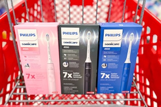 3 philips sonicare 4100 electric toothbrushes in a target cart