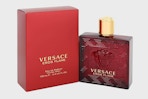 a red bottle of cologne 