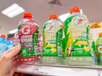 hand grabbing a gatorade zero sugar off a target shelf