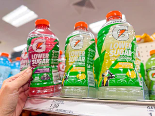 hand grabbing a gatorade zero sugar off a target shelf
