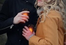a couple holding hand warmers