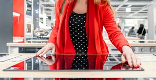 person shopping for electric stovetop