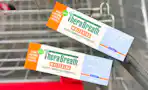 2 therabreath toothpastes in a cart
