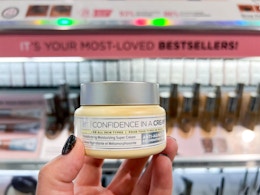 IT cosmetics makeup item in front of makeup shelf