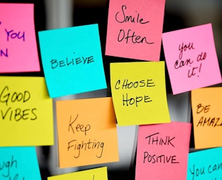 colorful Post-it notes on a fridge