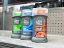 3 dove men+care deodorants sitting on a Walmart shelf