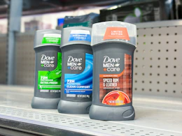 3 dove men+care deodorants sitting on a Walmart shelf