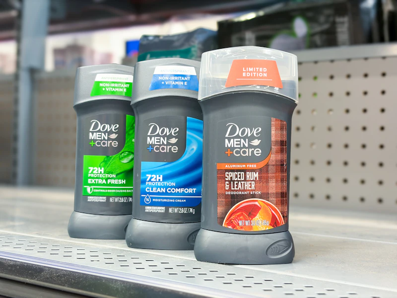 3 dove men+care deodorants sitting on a Walmart shelf