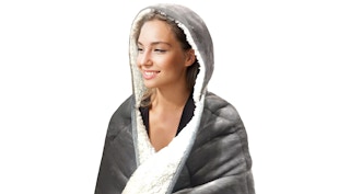 a woman wearing a hooded weighted blanket