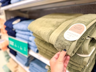 Threshold bath towel being pulled off shelf at Target