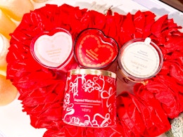 4 threshold valentine's day candles together in a heart wreath