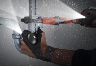 gloves working on pipe