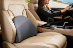 a lumbar support pillow on a car seat