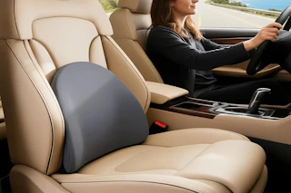 a lumbar support pillow on a car seat