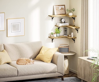 three wall mounted shelves in a room