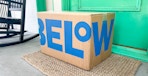 A Five Below box sitting on a front porch