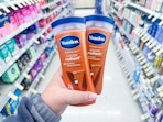 hand holding vaseline lotion in walgreens