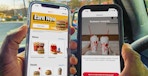 chick-fil-a vs. mcdonald's -Someone sitting in a car holding two phones, one displaying the McDonalds rewards app and the other ...