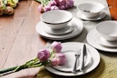 Lifestyle image of the 12-piece Gibson Home Everyday Stoneware Dinnerware Set (white)