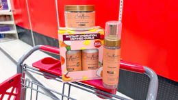 3 sheamoisture hair care products sitting on a target cart