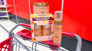 3 sheamoisture hair care products sitting on a target cart