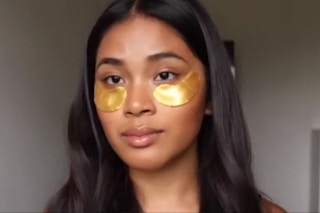 A girl wearing Dermora gold under eye masks.