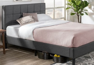 gray upholstered platform bed