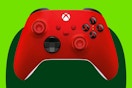 Stock image of a red Xbox Wireless Controller over green max shape background