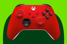 Stock image of a red Xbox Wireless Controller over green max shape background