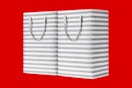 a laundry basket 2 pack on a red background