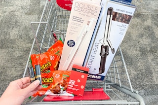 CVS shopping cart with reese's, neutrogena, conair, and revlon products