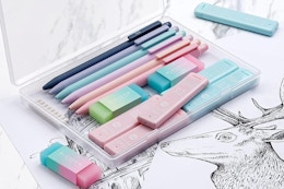 a pack of mechanical pencils and erasers