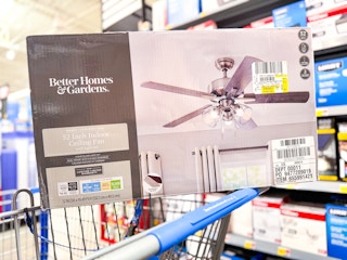 the package of a Better Homes & Gardens ceiling fan on a Walmart shelf