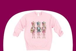 target nutracker sweatshirt on maroon and white background