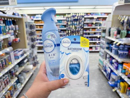 hand holding febreze products in walgreens