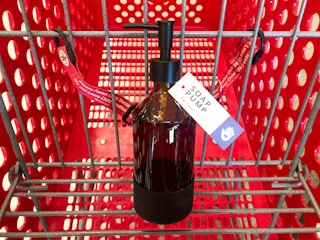 glass soap bottle in Target shopping cart