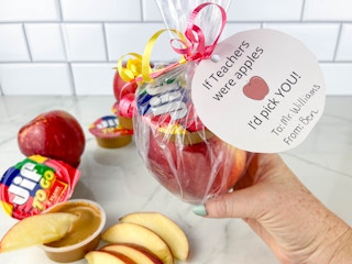 apples and individual peanut butters as a teacher gift on counter 