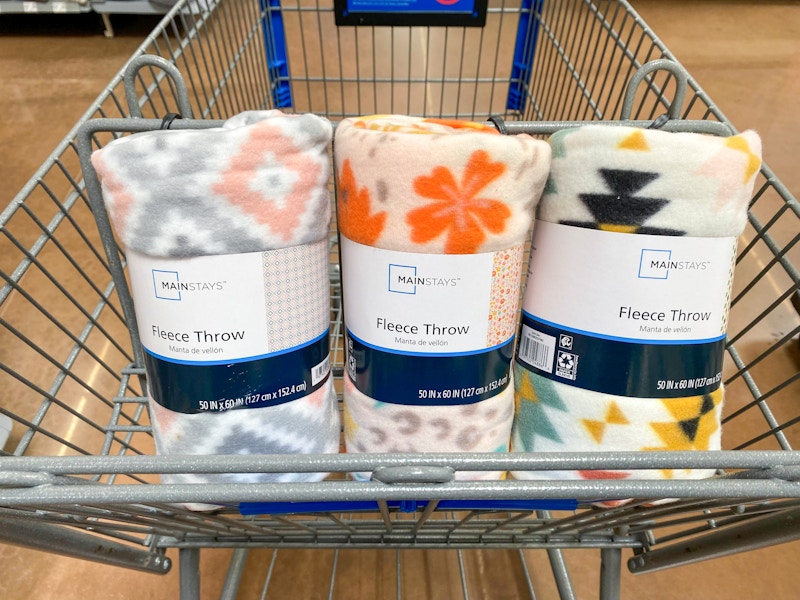 three mainstays fleece throw blankets in walmart cart