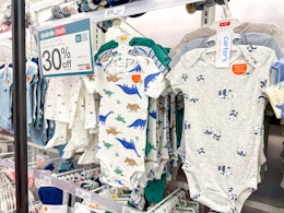 carter's baby bodysuits sitting on a target shelf