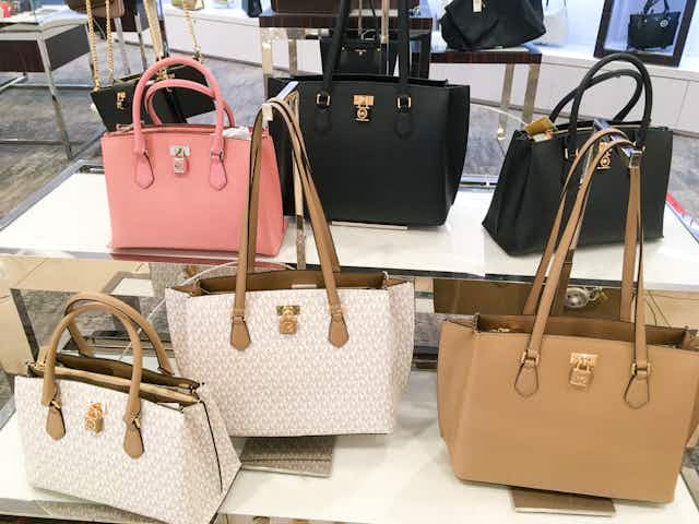 Spring Sale at Michael Kors: $69 Crossbody, $99 Backpack, and $109 Large Tote Bag card image