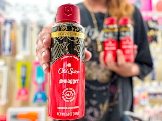 person holding old spice swagger deodorant